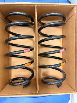 LIKE NEW Only 300 miles. Pair of Coil Springs with Color Markings