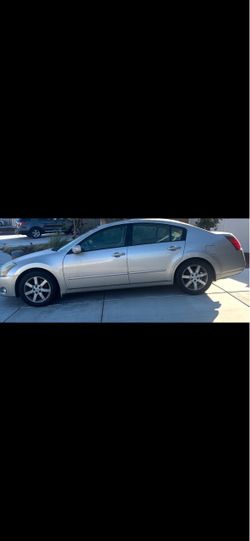 Nissan Maxima Silver 4-Door Sedan