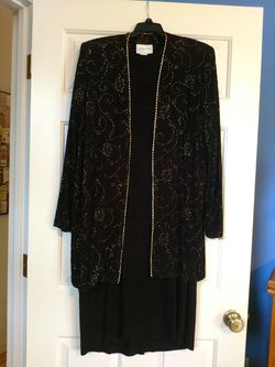 Black dress with a gold accented jacket. Size 14. Very good condition.