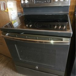 GE SLATE COLOR GLASSTOP STOVE CONVECTION OVEN....$ 300