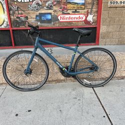 Co-op Cycles CTY 1.1 – Bicicleta Urbana/Commuter – Talla L – $299