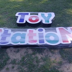 "Toy Station" signs