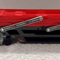 Hot Wheels Mega Car Hauler Semi Truck is a toy display truck