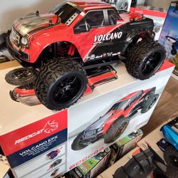 Redcat Racing Volcano EPX 1/10 RC Monster Truck brand new in a box including battery and a charger