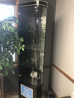 Tall black glass cabinet