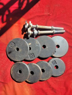 1" HOLE  70LBs WITH DUMBBELL HANDLES.  4-10s  4-7.5s
11525 S HALSTED /7111.S WESTERN 
60$ CASH ONLY AS IS