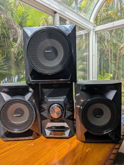 Sony MHC-EC919iP 700W 4-piece shelf stereo system with a CD player and iPod dock.