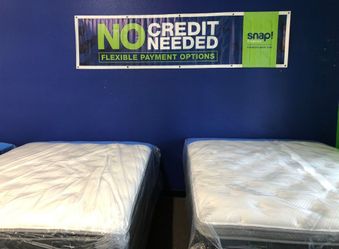 New Mattresses Still in Plastic Wrap
