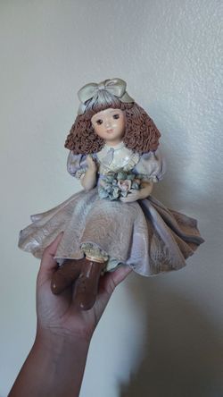 Vintage Ceramic Girl Figurine with Flowers