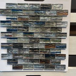 12x12 glass Tile  liquidation price $6 Sqft $22 retal  nobody  beat my prices   1936 Hinton Dr Irving Tx   I have several styles to choose from   