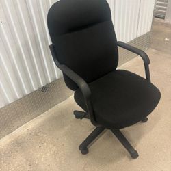 Office cloth chair swivels and leans back and goes up and down.. $40