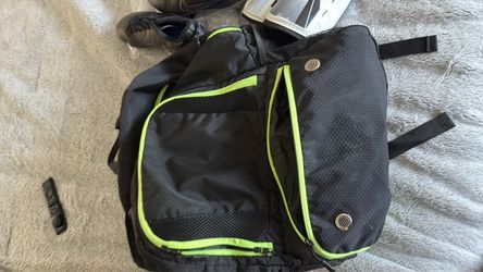 Soccer cleats shin guards and backpack