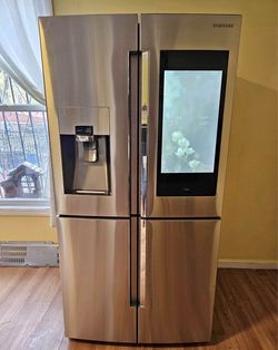 36 wide 4 door Samsung fridge with front screen