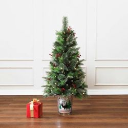 4 ft. PreLit Green Pine Artificial Christmas Tree Potted with Red Berry Decorations