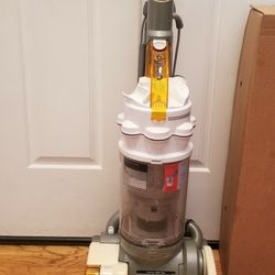 NEW cond  DYSON ANIMAL VACUUM  , WITH ATTACHMENTS   , AMAZING POWER SUCTION  , WORKS EXCELLENT  , IN THE BOX 