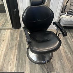 Professional barber chair great condition. Clean black leather with hydraulic lift and footrest.