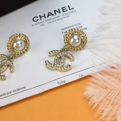Authentic Chanel Chanel Rose Gold Pearl Earrings for Sale in