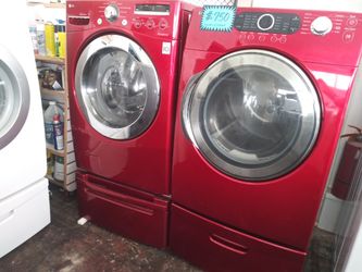 Front load washer LG and electric dryer Samsung set with pedestals in excellent conditions