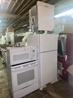 4pc package deal: NEW fridge, electric stove, microwave and dishwasher with 1 year. Manufacturer warranty