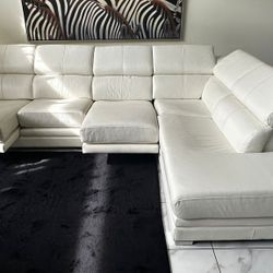 WHITE GENUINE LEATHER SECTIONAL SOFA W RETRACTABLE SEATS by QUEBEC 69 - LIKE NEW - delivery is negotiable