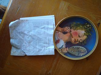 Collector plate with authenticity