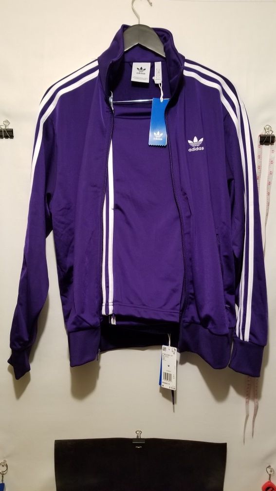 Adidas track suit size medium