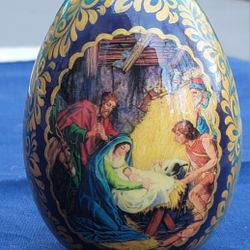 4"h×3"w Decoupage And hand-painted Russian egg featuring a Nativity scene. 
