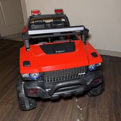 Aosom Red 12v 2 seater police car 