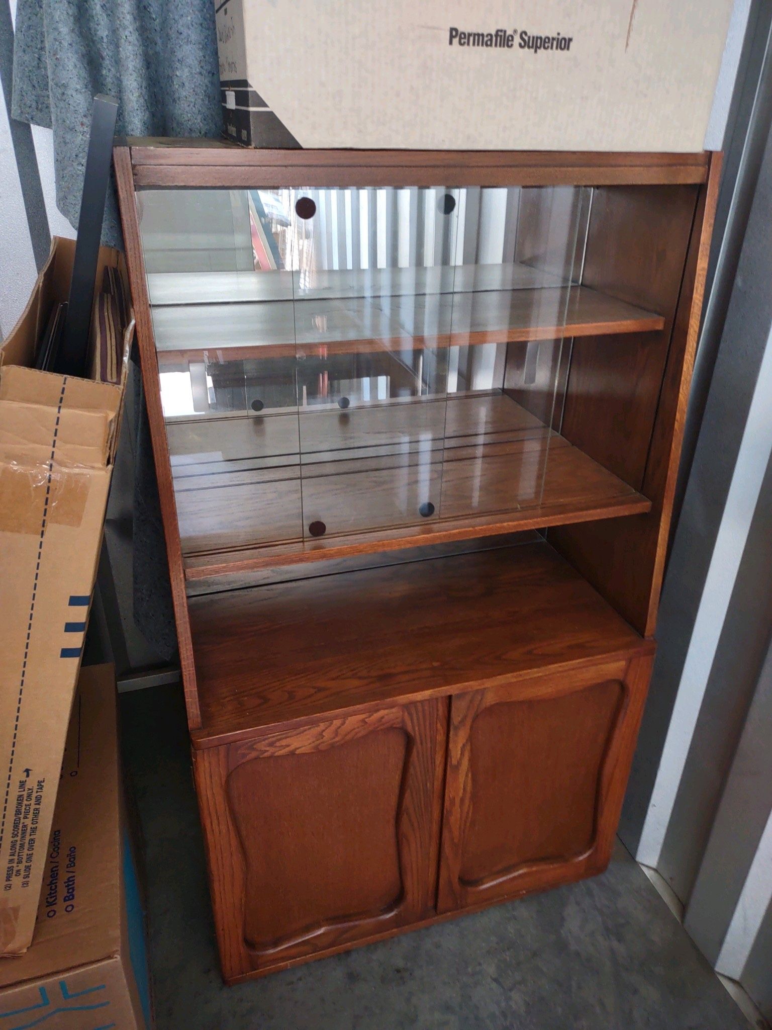 Wooden cabinet with glass doors