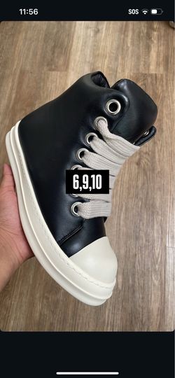 Rick’s black high top converse