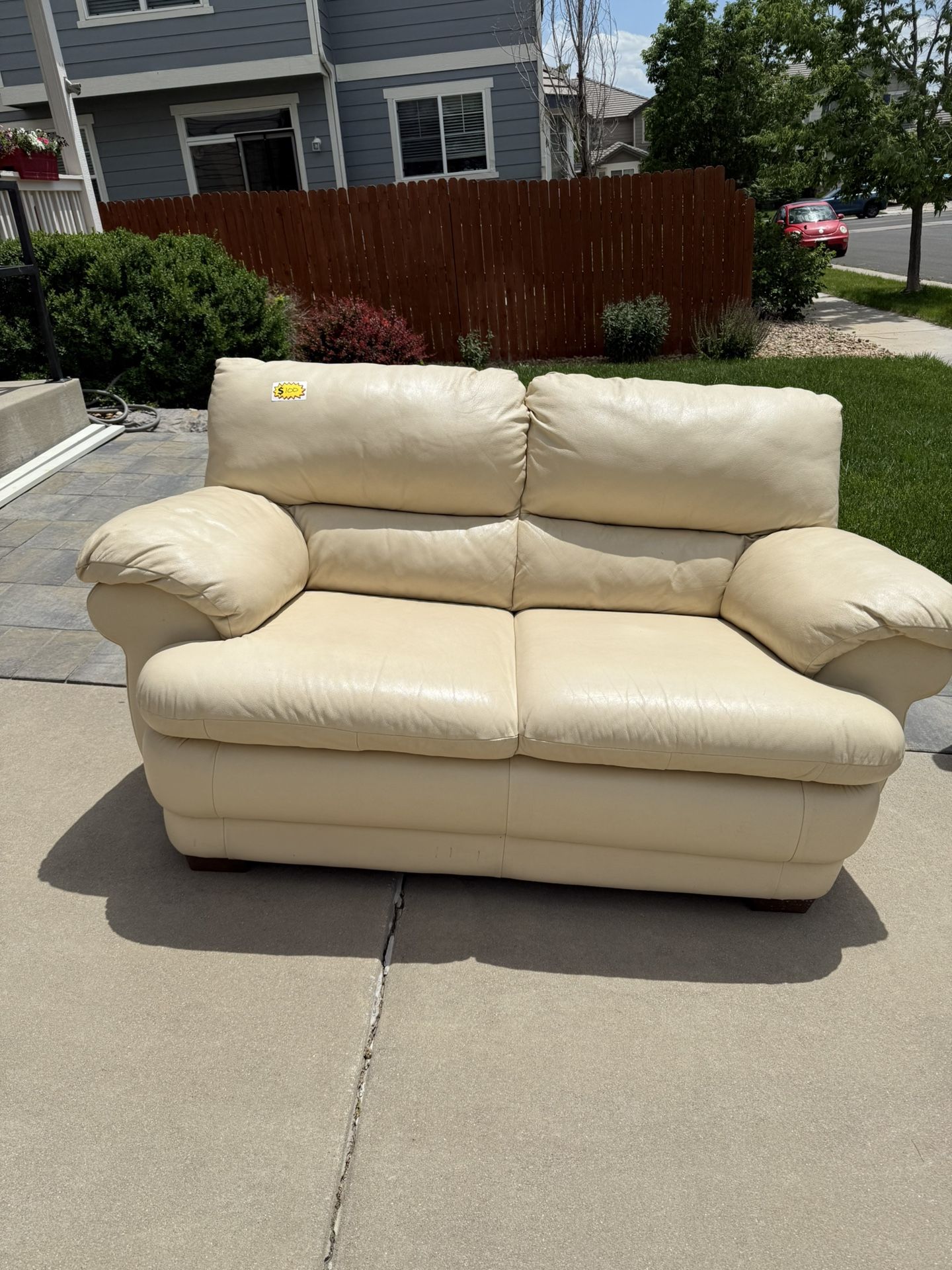 Beige Leather Loveseat