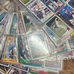 Baseball football basketball cards.