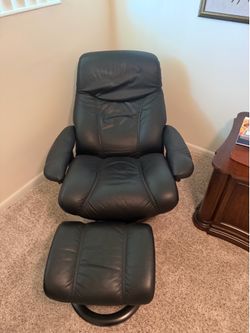 Stressless black leather chair and ottoman