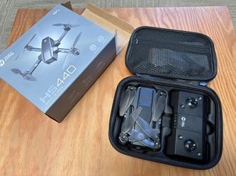 Holy Stone HS-440 drone with charger