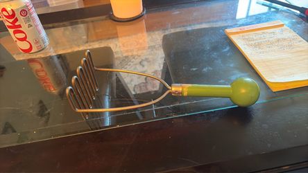 Vintage Potato Masher with Green Wood Handle
