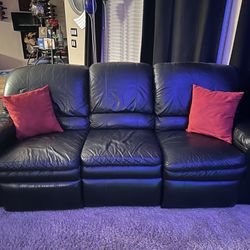 Black leather La-Z-Boy couch and loveseat