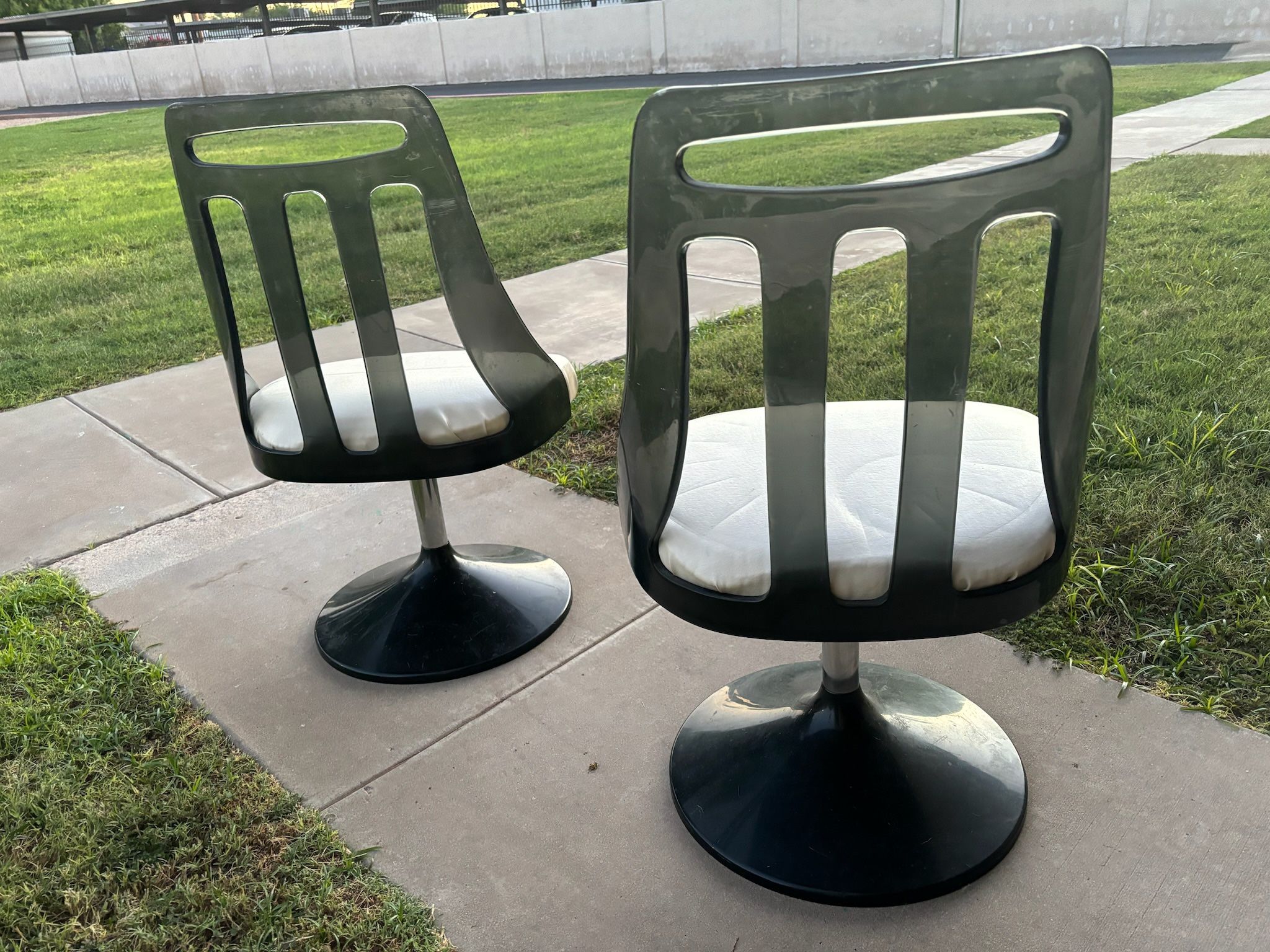 Space Age Lucite Swivel Chairs