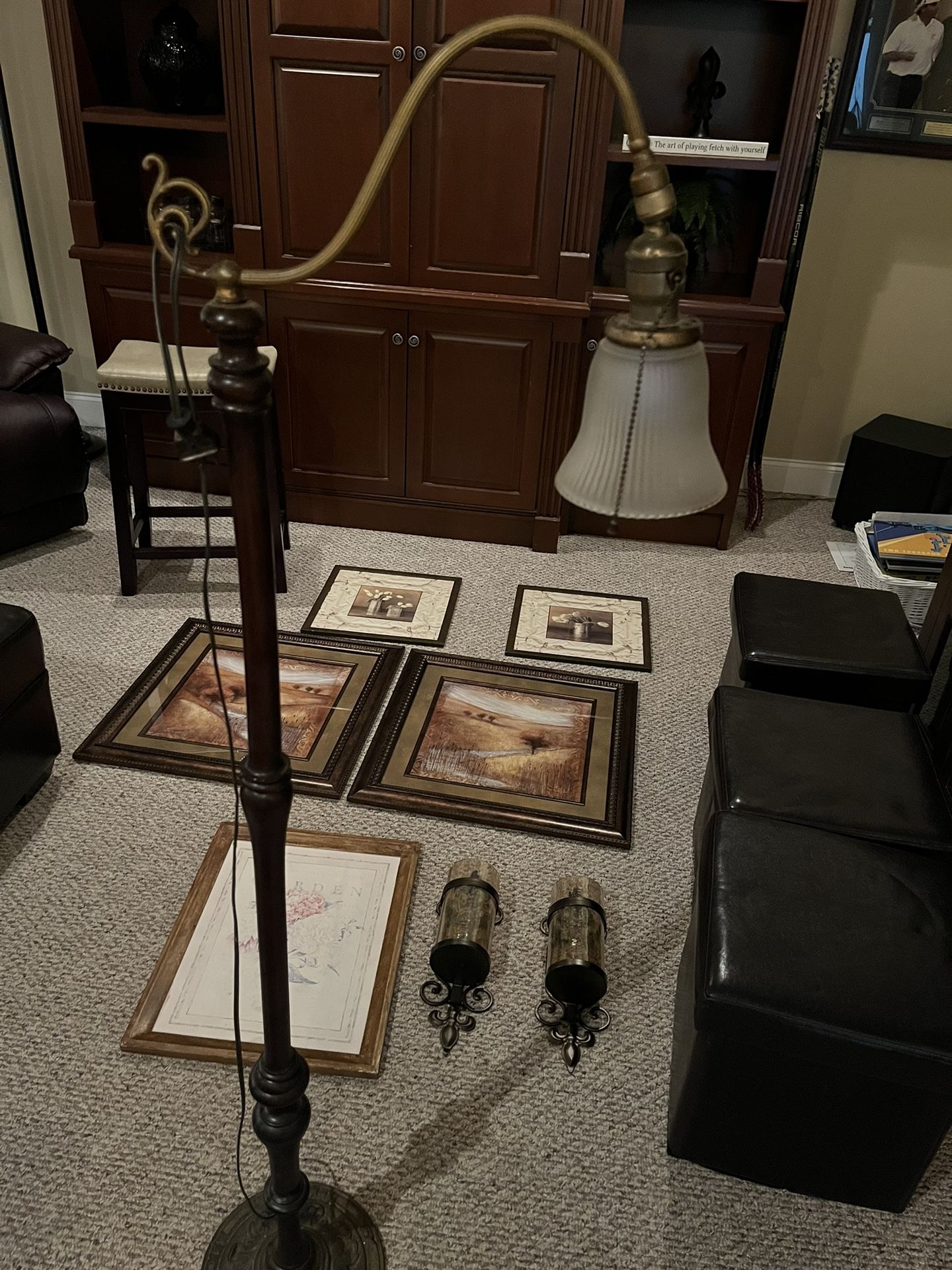 Pictures, Sconces, and Footstool Storage