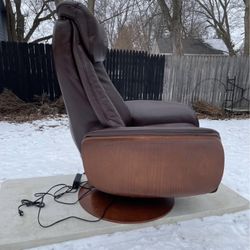 Modern Power Swivel Recliner.