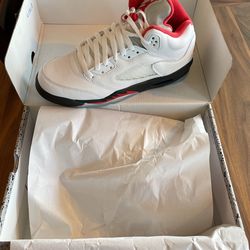 Brand New. Grade School Size 6.5