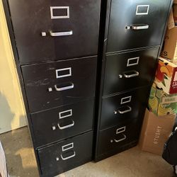 Two Legal Size Four Drawer Filing Cabinets 