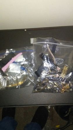 Bag of watches over 20 and a bag of parts