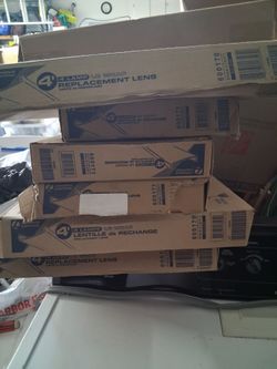 Fluorescent light fixture replacement lenses