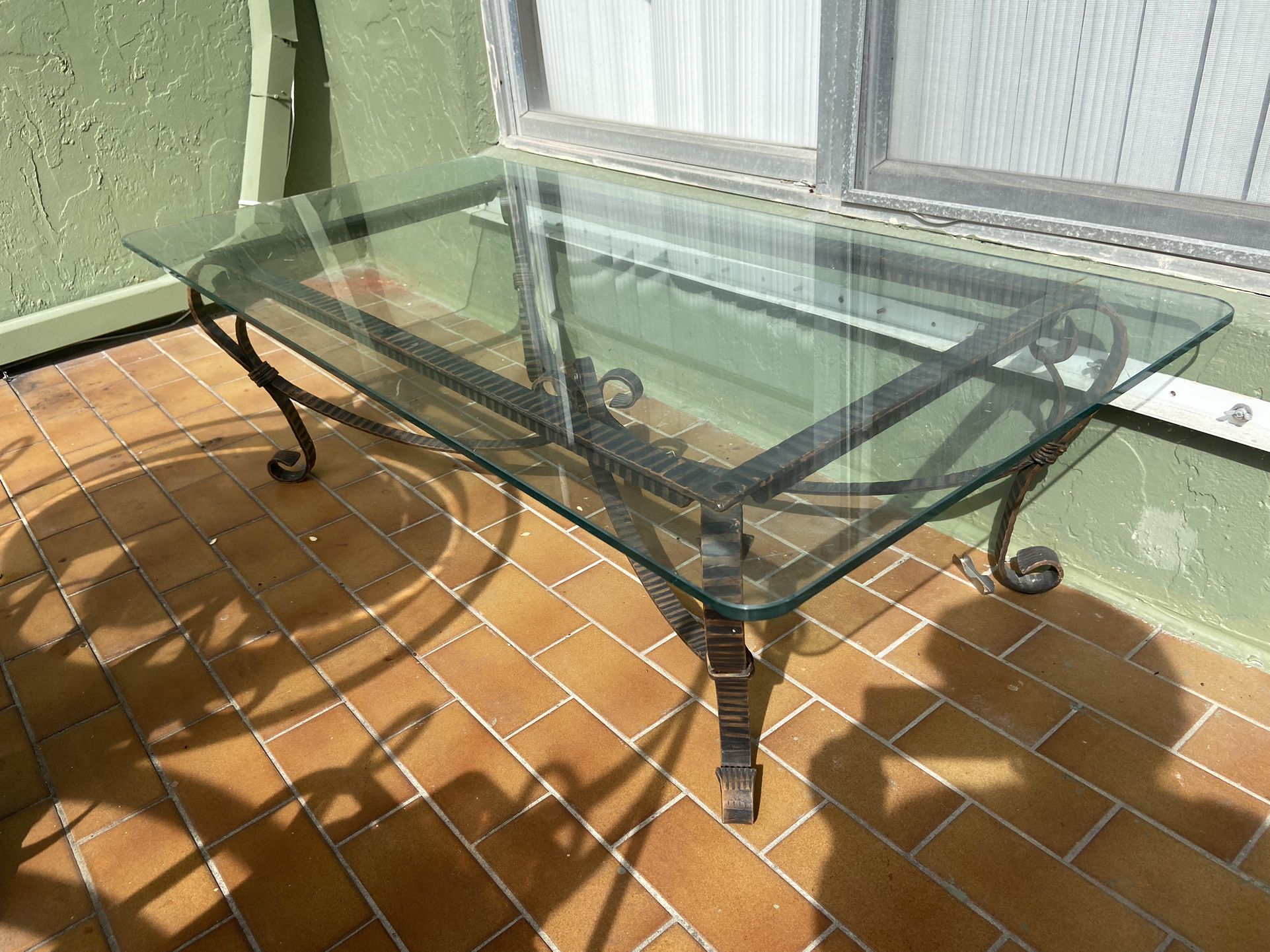 Coffee Center, Table, Glass and Iron, Very Strong, Beautiful, Piece,  only $25  measure:  28 x 58 We located  91st St., Collins avenue  At this price 