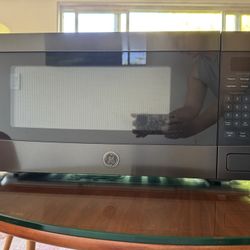 GE PROFILE - 1.1 CU. FT. COUNTERTOP MICROWAVE OVEN - BLACK STAINLESS STEEL