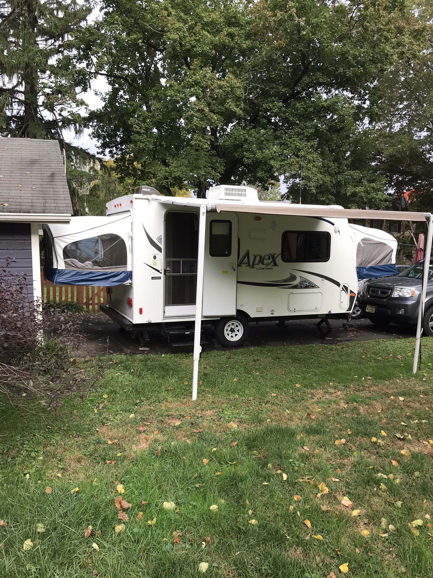 Camper trailer. 2013 Coachman Apex 151RBX with cover and other extras