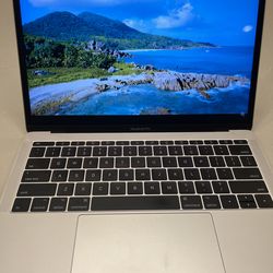 MacBook pro- Retina screen Mid 2017 -with original charger and cable