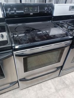 Kenmore stainless and black glass-top stove - Free delivery