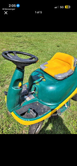 Yard man riding mower