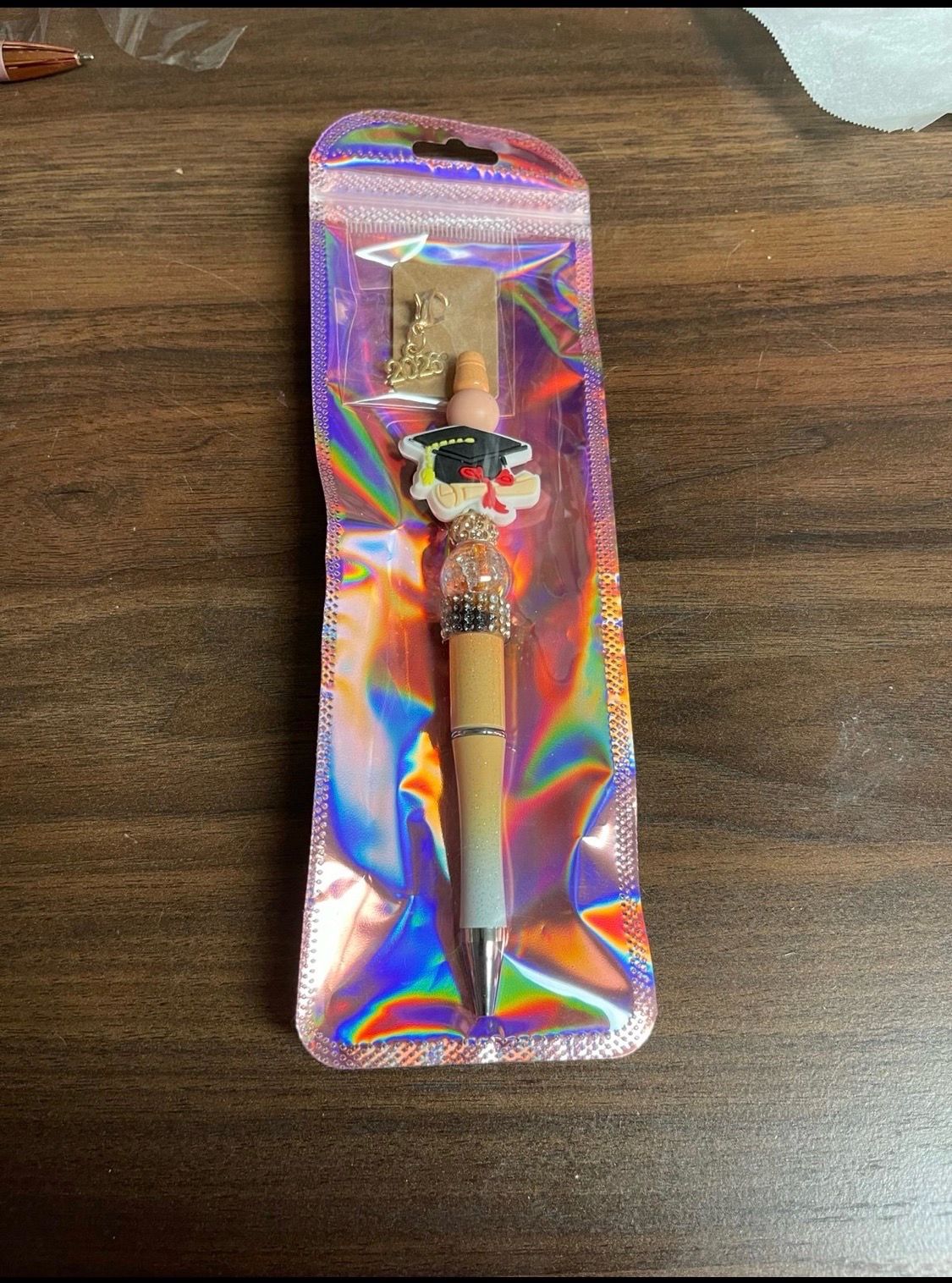 Adorable, senior pen with charm